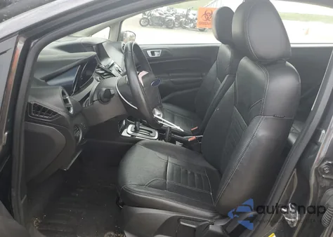 2015 Ford Fiesta Titanium z USA, uszkodzony, nr VIN 3FADP4FJ7FM178732